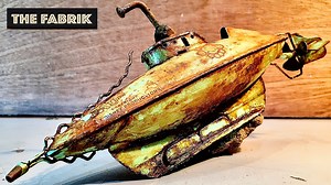 Here is a restoration of a clockwork tintoy submarine. The toy was made in the UK by Sutcliffe Pressings Ltd, circa 1954. Based on Disney's film version of "20,000 Leagues Under the Sea" ("Vingt mille lieues sous les mers", 1870), by Jules Verne. | TheFabrik