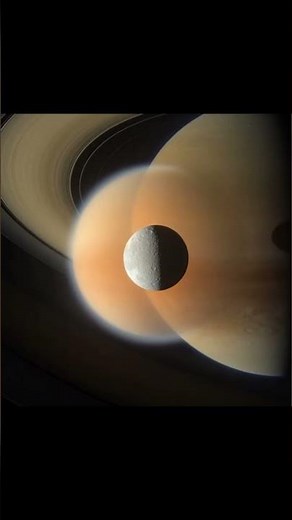 December 10, 2011: Cassini catches a perfect cosmic photobomb.#universe