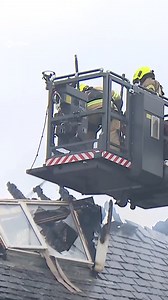 Dozens of firefighters battling blaze at two houses as road closed | STV News