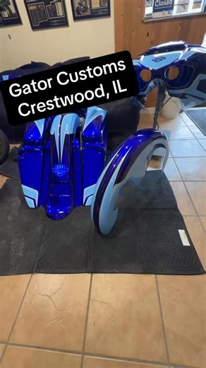 Custom paint done right. This Big Wheel Bagger body set features layered graphics, precision paint work, and our illuminated Gator Glass graphics for a deep, glass-smooth finish that turns heads from every angle 🔥 #BigWheelBagger #BaggerBuild #CustomPaint #ShowBike #BaggerNation | Gator Customs