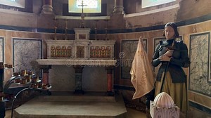 Marseille, France 04.14.2025 Joan of Arc Statue in Armor Beside Marble Altar