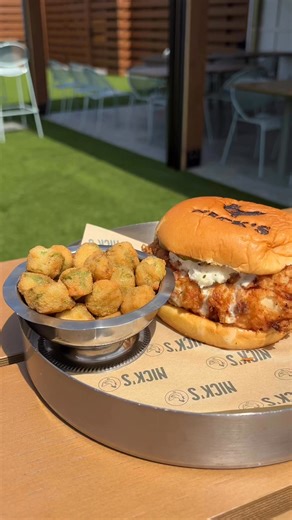 🔥🐔 Hot Hen Chicken Sandwich 🐔🔥 Crispy hot hen chicken topped with mayo and ranch slaw, stacked on a soft bun and paired with golden fried okra 😮‍🔥 Spicy, crunchy, and straight-up crave worthy. Come grab one today 🍽️🔥 | Nick's Restaurant