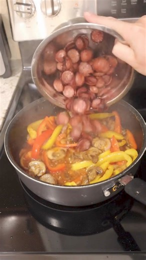 Creamy Cajun Pasta A real clean-out-the-fridge dinner! You will need: 🌭 Kielbasa or smoked sausage $2.87 🍄 Sliced mushrooms about 1 cup 🧅 Onion, about one half 🫑 two bell peppers sliced 🌶️ about 1 teaspoon of Cajun seasoning 🧄 garlic, 1-2 cloves minced 🍗 2 C chicken stock 🥫 1 can of diced tomatoes 🍝 2 cups of penne pasta 🧀 grated cheese, your choice, I used pepper jack and mozzarella about 1 cup 🐄 1/2 block of cream cheese 🧈 Oil and or butter Heat oil and butter in a pan and toss in 
