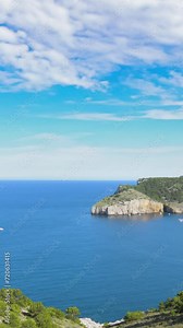 Small bay of Cala Montgo in Costa Brava. Montgo beach is a natural and awesome place of la Escala and Torroella de Montgri in Girona province, Catalonia, Spain. Vertical video