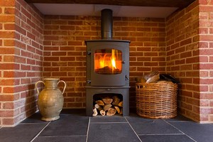 What To Put Behind A Wood Burning Stove: Heat Shield Ideas