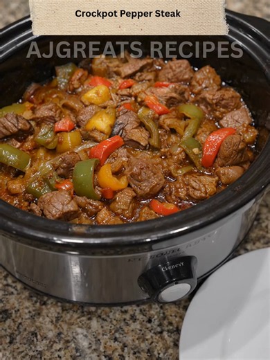 Crockpot Pepper Steak This flavorful slow cooker pepper steak is packed with melt-in-your-mouth beef strips, vibrant bell peppers, sweet onions, and a rich, savory sauce that pairs perfectly with rice or noodles! 😍 Full recipe is on my page — right under my profile picture ⬆️