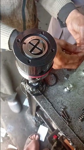 a diesel fuel injection pump head rotor assembly, a critical component in a diesel engine's fuel....