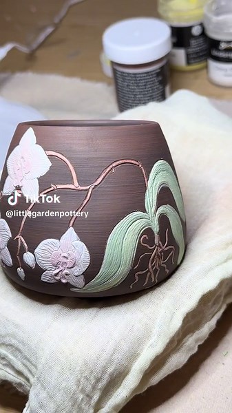 Orchid cup in the works, grateful for the iron oxide dark chocolatey goodness ✨✨✨ #ceramicart #artvideo #potterytiktok #ceramics #fyp #potteryart #natureart #botanicalart #fyp #ceramica #pottery