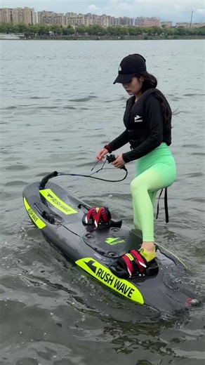 RUSH WAVE ,Gasoline-powered surfboard, floating on the water #rushwave #Surfing #surfboard #gasolinesurfboard