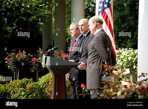 NO FILM, NO VIDEO, NO TV, NO DOCUMENTARY - President George W Bush introduces Goldman Sachs Chairman and CEO Henry Paulson (center) as the new U.S. Treasury Secretary replacing Sec. John W. Snow, in the White House Rose Garden in Washington, D.C., USA on May 30, 2006. Photo by Chuck Kennedy/KRT/ABACAPRESS.COM Stock Photo - Alamy