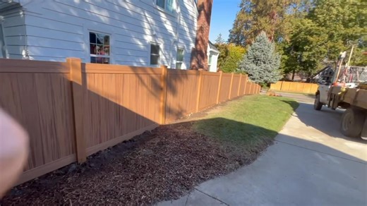 We offer so many different vinyl colors including this beautiful “wood” look. Give us a call for a quote today (509)868-1853 | ALL 4 Fencing LLC | Facebook