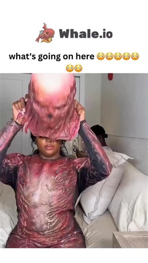 Laugh_leakkk on Instagram: "- The post shares a 81-second video of a person in a skin-tight, red latex Vecna costume from Stranger Things undergoing a humorous nighttime skincare routine, applying masks and lotions while posing dramatically on a bed, overlaid with text like “Vecna’s nighttime routine.” - Posted by Nigerian influencer @inkwakuzi_ on December 17, 2025, the caption “what’s going on here 😳😳😳😳😳😳😳” captures bewildered amusement, driving 2.7 million views and 5,975 likes in unde