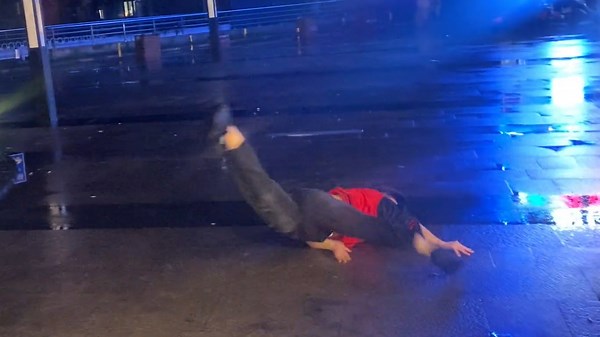 Person fails while attempting acrobatics in Shanghai