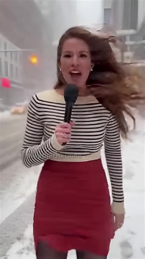 My hair’s doing a whole weather system! 😅 But stay warm, everyone! Ever lost a mic to the wind? 💨 #weathergirl #snowday #windy #reporter