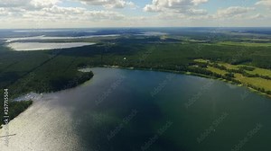 Footage from above. Drone shot. Amazing Shatsky settlement with green forest and lakes. Region of beautiful nature. Summer, outdoors.