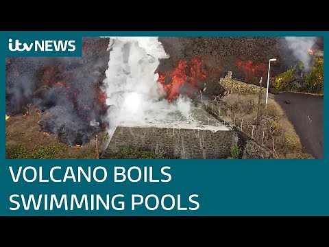 La Palma volcano: Swimming pools bubble up as lava spreads through streets | ITV News