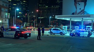 Man, building struck in shooting in downtown Dallas