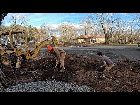 Digging a trench and laying pipe