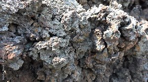 Spongy Porous Broken Basalt Stones.Frozen lava magma Basalt is a common extrusive igneous volcanic rock formed from the rapid cooling of basaltic lava exposed at or very near the surface of earth. 4K