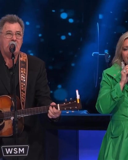 Vince Gill and Sonya Isaacs deliver a heartfelt performance on the Opry stage. #grandoleopry #Opry100 #grandoleopry100 | Country Music Bulletin