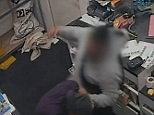 Terrifying moment man jumps counter and punches post office worker