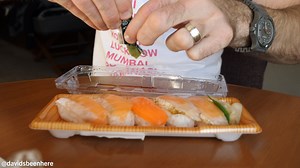 Did you know that convenience store food is super popular in Japan? It’s not at all like the convenience store food here in America. In Japan, the convenience store food is fresh, tasty, and expertly-made. There are three main chains: 7-Eleven, FamilyMart, and Lawson. So for breakfast on my second full day in Tokyo, I ran out to all three chains and bought a bunch of food to try. Come along with me as I hunt down amazing treats like sushi, several types of onigiri, hand rolls, a rice-covered sof