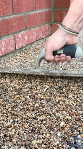 the process of plastering sand powder mixture on the wire mesh in the garden area #construction