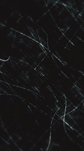 Download Vertical - abstract background animation with gently moving distressed white lines and grunge noise texture. This dark minimalist textured motion background is full HD and a seamless loop. for free