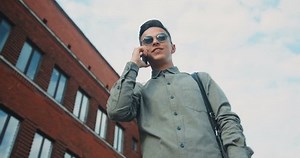 Confident Boy Guy Talking Phone Looking Stock Footage Video (100% Royalty-free) 29050432 | Shutterstock