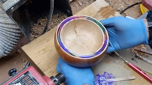 Multi-coloured resin inlays for bold design