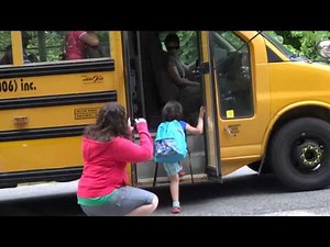 First school day getting on bus.