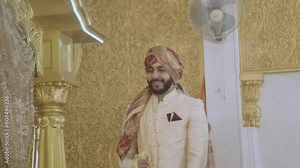 Sikh Wedding Ceremony - Indian Couple Walking Slowly With Groom Leading The Bride. medium shot