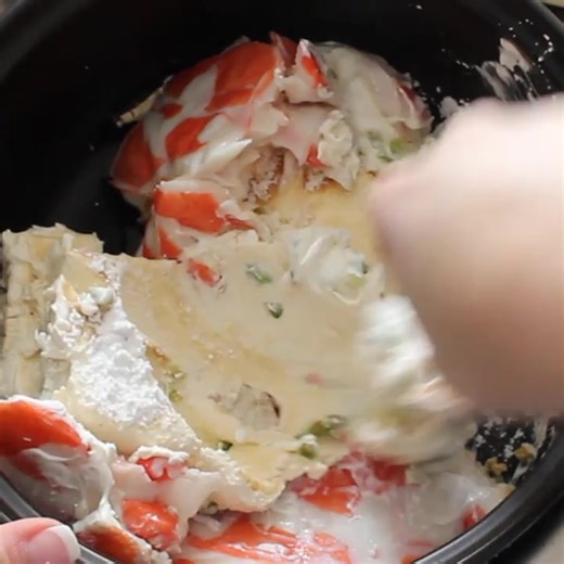 Everyone loves this tasty Crock-Pot Crab Rangoon Dip! [Gluten Free, Low Calorie, Low Carb, Low Sodium & Low Sugar] Get the full recipe & instructions here>> https://crockpotladies.com/crockpot-crab-rangoon-dip/ | Crock-Pot Ladies