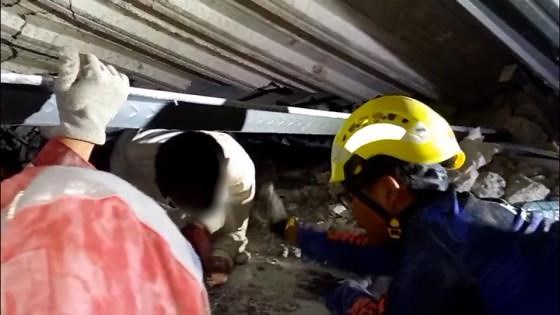 Survivors pulled from rubble in collapsed school in Indonesia