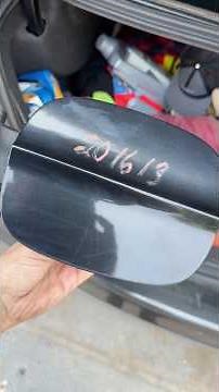 Replacing a Ford Fusion fuel door with a junkyard part for only $15!