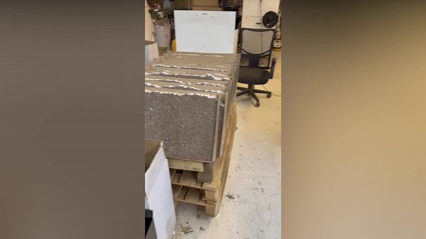 Police raid 'illegal cigarette factory' with English writing on packets