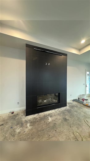Elegant Black Porcelain Tile Fireplace Design Ideas