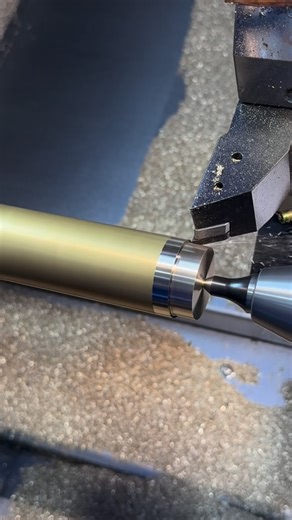 Adam Booth on Instagram: "Setting up up the first production job in my @milltronicsusa SL8 This is my first attempt at using a programed work-stop for the material to begin running the sub-program. Once the part is cut-off I’ll start the program from the beginning, facing the parted end and drilling a center. Pull material to worktop then continue until completed. #abom79 #milltronics #cnclathe #machineshop #manufacturing"