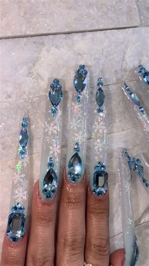 Ryan 🪬 on Instagram: "NEW NAILSSSS 😍😍❄️❄️🩵🩵!! @muneca_beauty_nails CRYSTALS BY @bluestreakcrystals use code RYAN for $$$ off your order ✨"