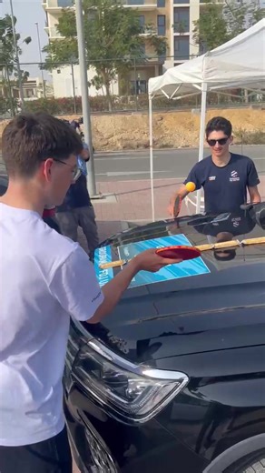 Improvised Table Tennis Match at the Paddock