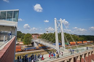 7.1K views · 230 reactions |  A recap of yesterday’s opening of the Hunter Harrison Memorial Bridge! After many decades, we are so excited to complete this project. The bridge and additional 1,140-space parking garage are a wonderful addition to our campus! #FinallyBeatTheTrain | University of Memphis | Facebook