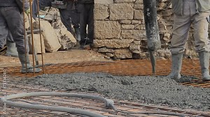 Concrete pouring works during commercial concreting floors