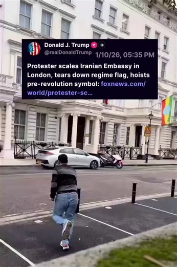 BOOM! 🇮🇷Fearless anti-regime protester scales the Iranian Embassy in London, rips down the Islamic Republic’s flag, and hoists the historic pre-1979 Lion & Sun emblem — the proud symbol of Iran before the 1979 revolution.Crowds below erupted in cheers as the old flag flew again.This is what real resistance looks like. The Iranian people are done with the mullahs.The regime is crumbling from within and abroad.Who’s next? 🔥