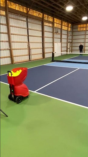 Lee Whitwell using the ERNE Pickleball training machine.