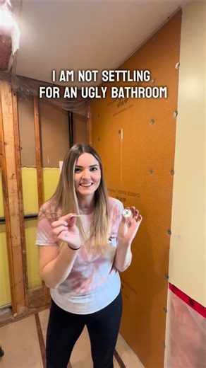 Theresa Vanderstar | DIY & Cabinetry Builds on Instagram: "I am NOT about to settle for an ugly bathroom and neither should you! So far I’ve: -Demolished my sad shower stall -Stolen space from a walk-in closet -Cut open my subfloor -Patched a rotten wall And now… things are finally coming together with wallboard, waterproofing (to the max) and floor tile! I faced my fear of the grinder 😅 and obsessed over every seam because… perfection. Next up is shower tile (and it almost broke me 