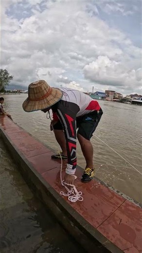 A cast net fishing traditional trap in the village #shorts