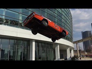 Slow motion General Lee stunt jump in Detroit at Autorama