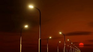 clip-1111074341-street-lighting-poles-against-sky-colors-sunset