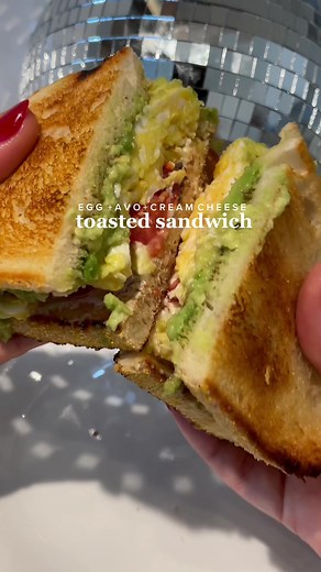 Carolina Salazar (@thecarolinalifestyle) - the dreamiest breakfast sandwich… EGG AVO TOASTED SOURDOUGH SANDWICH 🥑🍳 what you need: 2 slices sourdough, butter/olive oil, 3 pasture raised eggs, 1/2 avocado, cream cheese, cherry tomatoes, salt pepper - add a little butter to both sides of 2 sourdough slices, & toast each side on a pan - add 2 eggs 1 egg white to a pan with olive oil or butter and scramble (with a little salt) - add 1/2 avocado (smashed) to one of the slices pepper - add cream chee