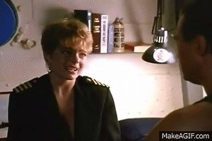 Under Siege - cake strip scene (Erika Eleniak).wmv on Make a GIF